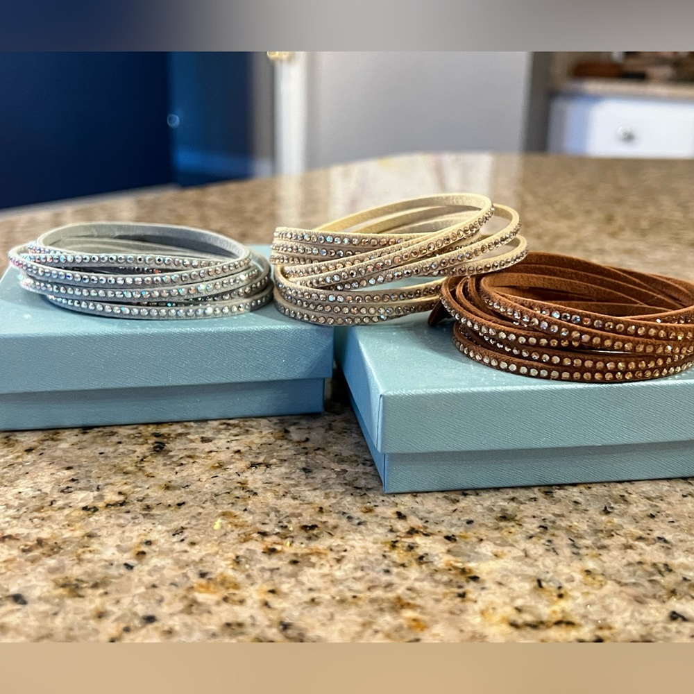 Brand new touchstone crystal wrap bracelets never worn - camel, gold and silver